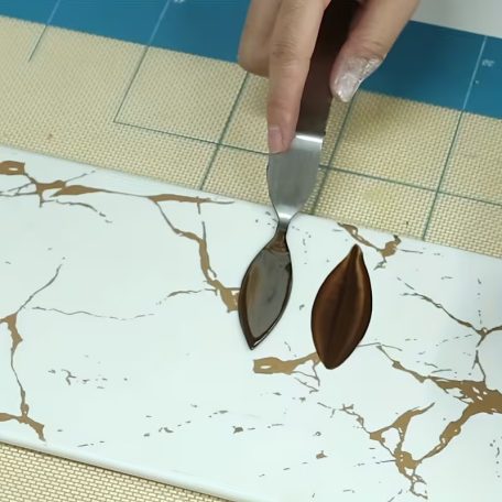 Rozsdamentes mintázó kés