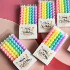 Hullámos szivárvány színű gyertya 6 db/cs